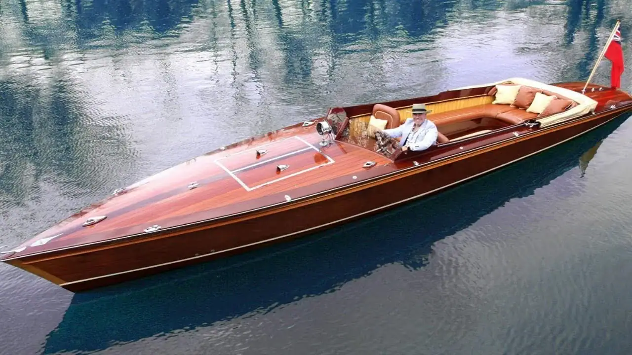 Wooden boat on the St. Clair River at the Algonac Boat Show — the water world that shaped a Marine and a family